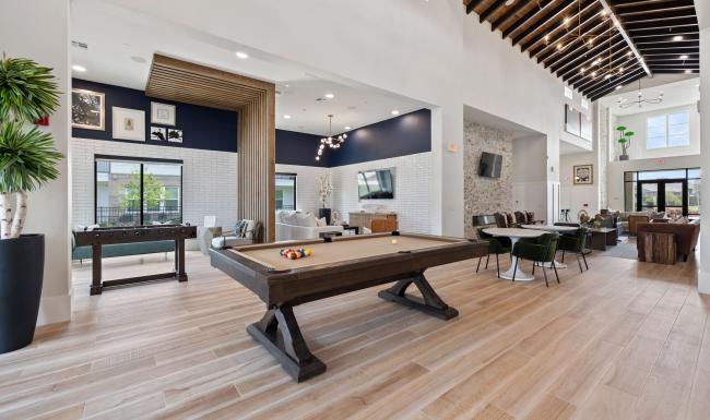 a room with tables and chairs